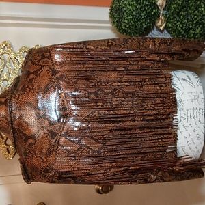 BlankNYC fringed faux leather jacket.